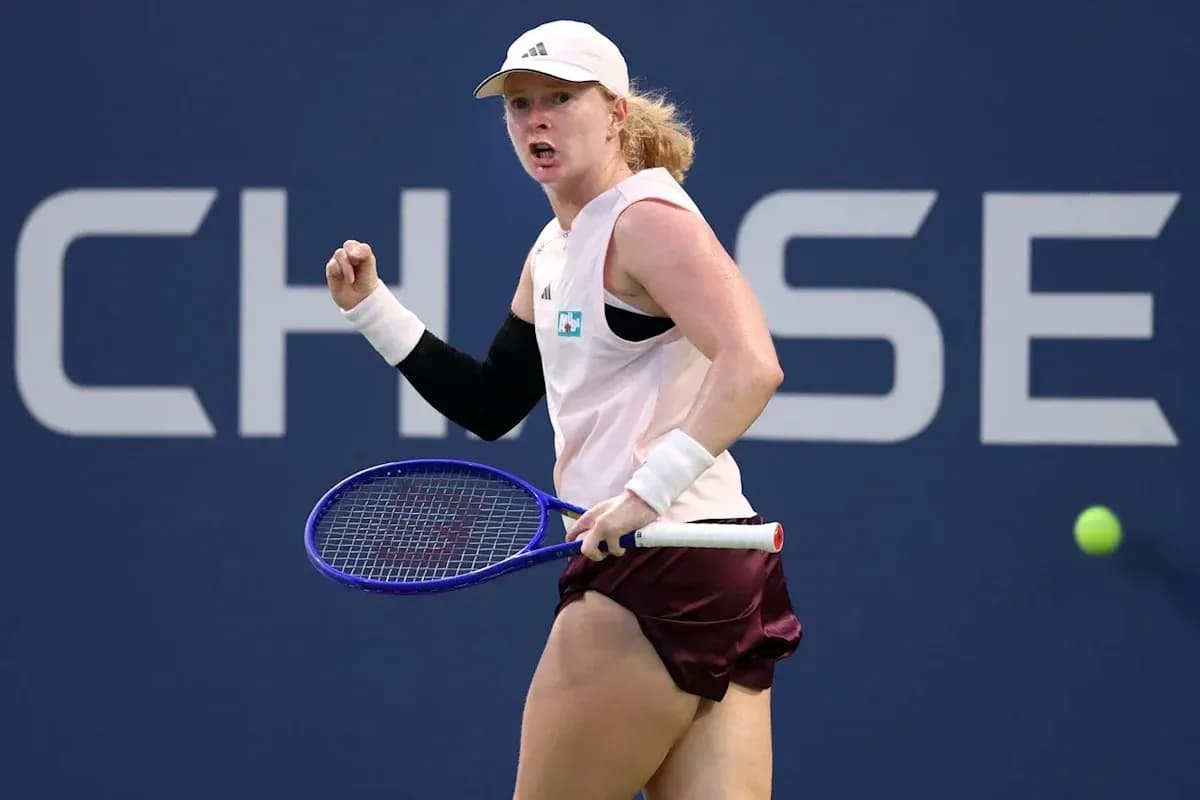 Tennis player celebrating after winning a point