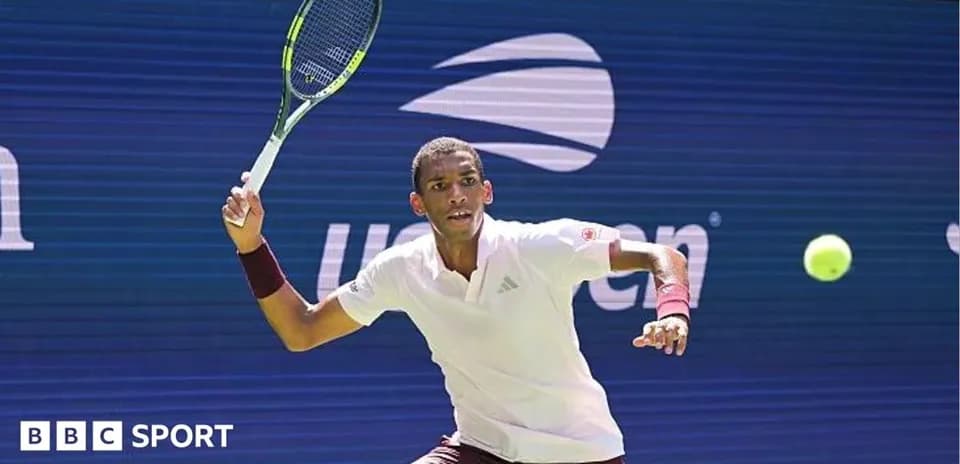 Player hitting a forehand during a tennis match