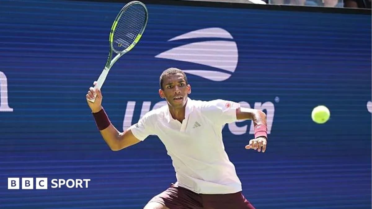 Player hitting a forehand during a tennis match