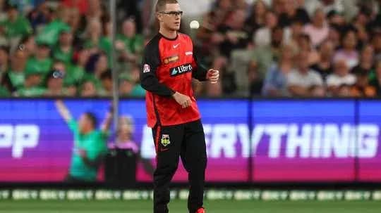 Player preparing to bowl during cricket match