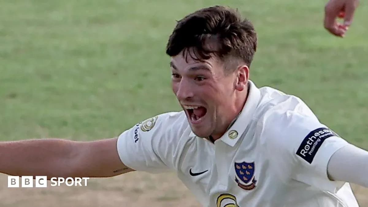 Cricketer celebrating a wicket on the field