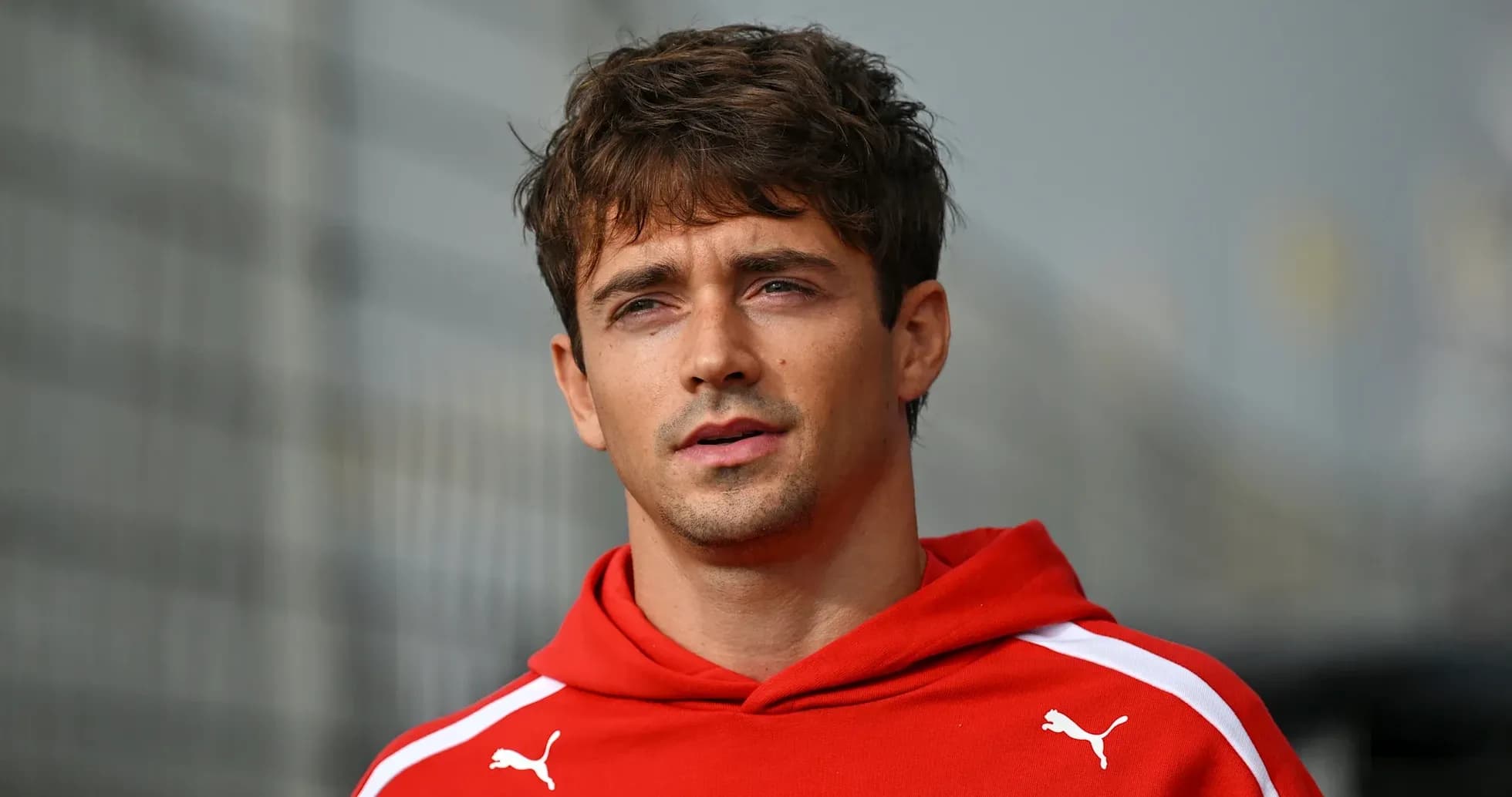 Athlete wearing red hoodie during event