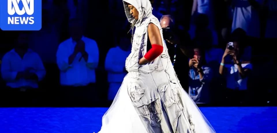 Person walking in unique outfit during event