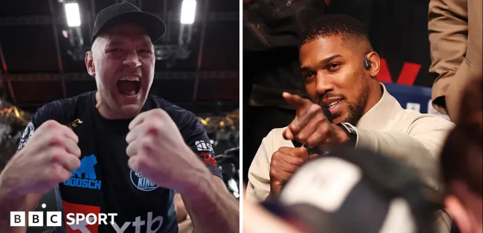 Tyson Fury celebrating and Anthony Joshua pointing at audience