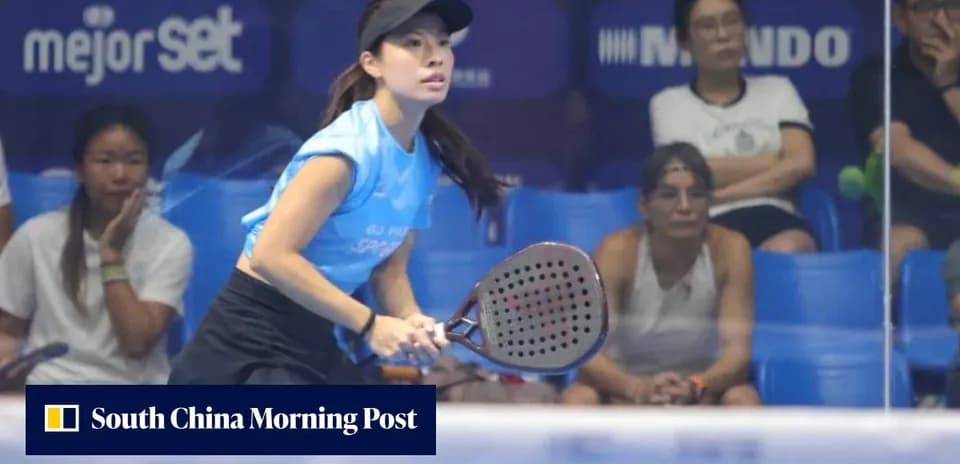 Female player preparing to hit a padel ball