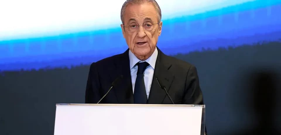 Man speaking at a podium during a conference