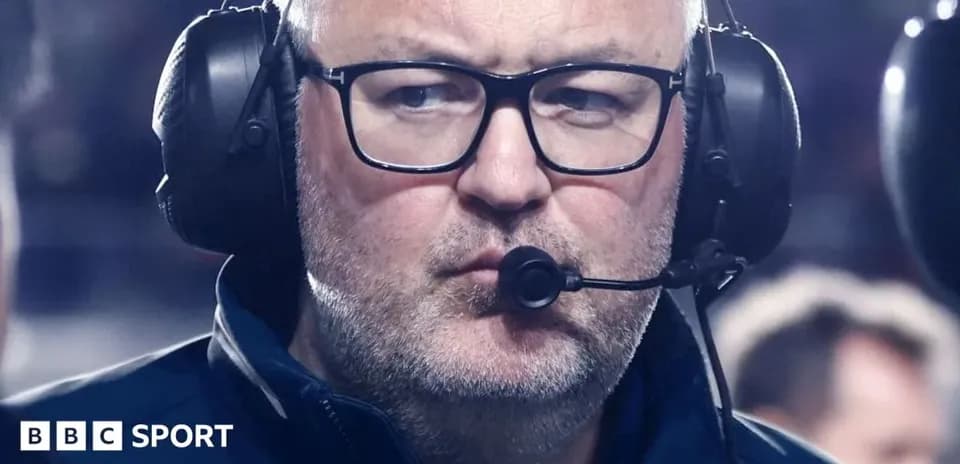 Coach with headset during a game