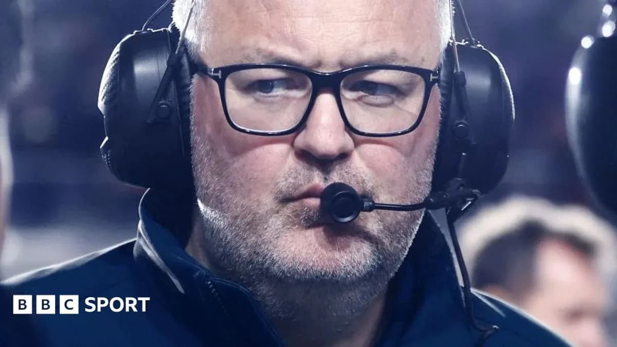 Coach with headset during a game