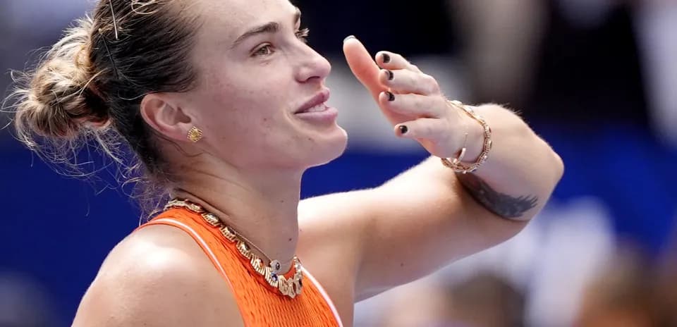 Tennis player celebrating after a match victory