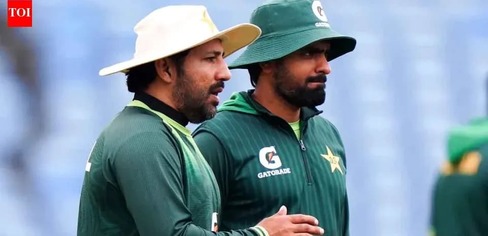 Two cricketers discussing during practice session