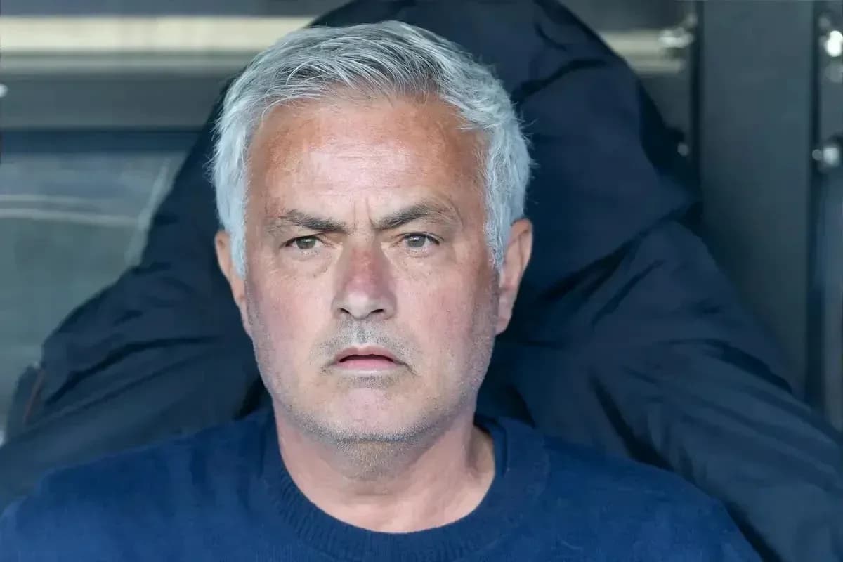 Coach observing the match from the sidelines