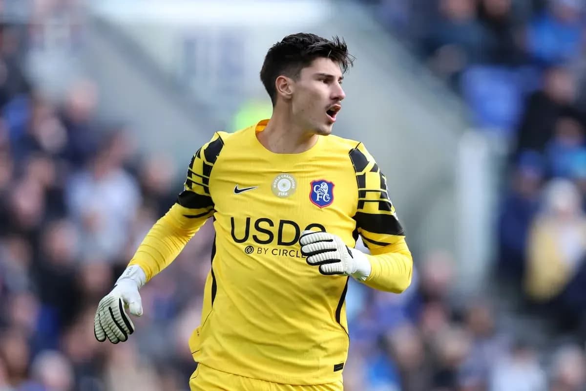 Goalkeeper in yellow kit during match action