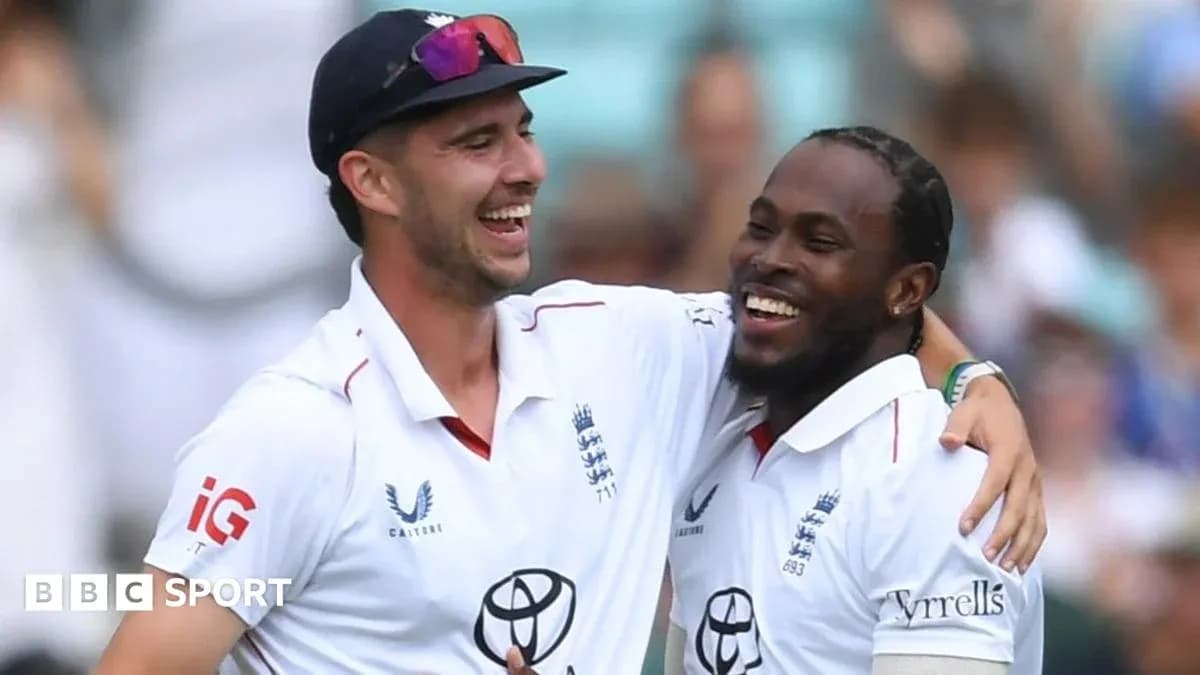 Two England cricketers celebrating on the field