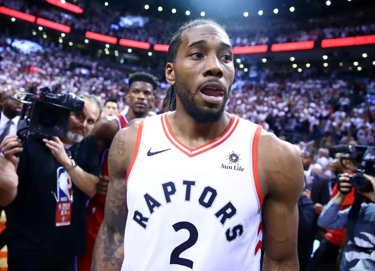 Kawhi Leonard walking off court after game