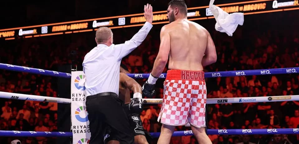 Referee stopping the match during boxing bout