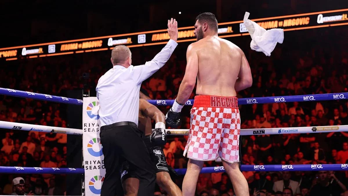 Referee stopping the match during boxing bout