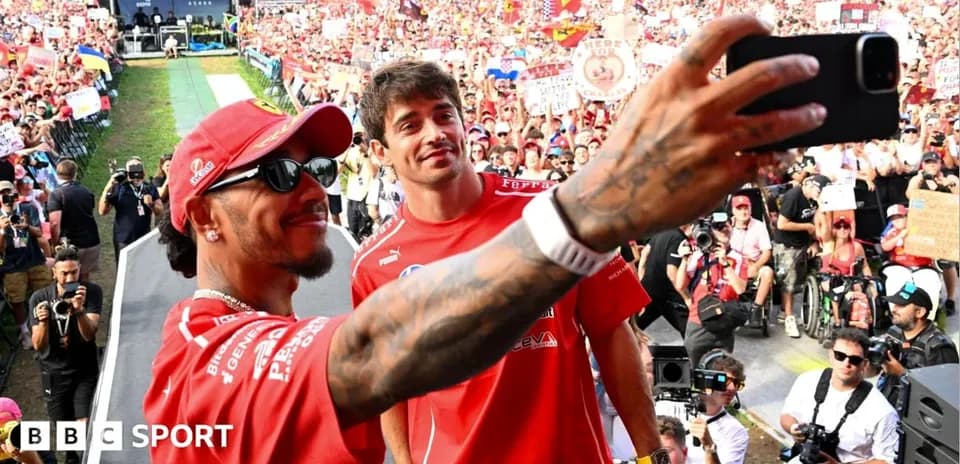 Drivers taking selfie with crowd at event