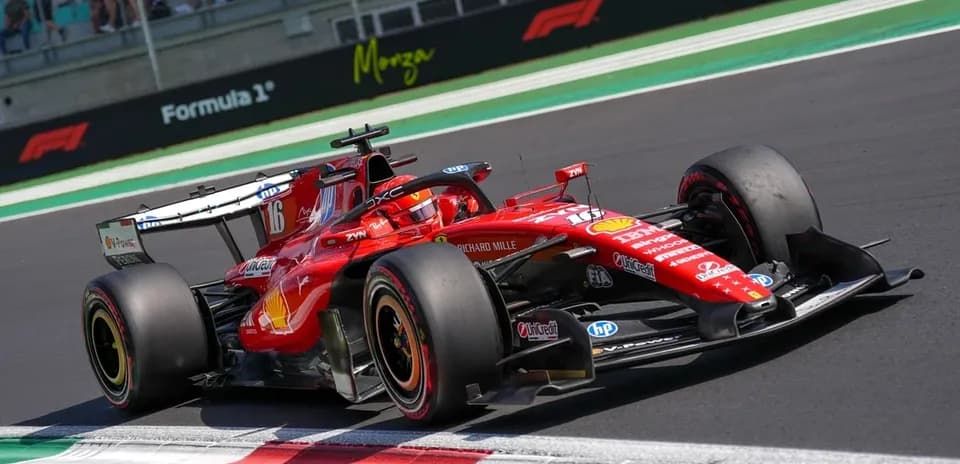 Ferrari F1 car racing on track during event