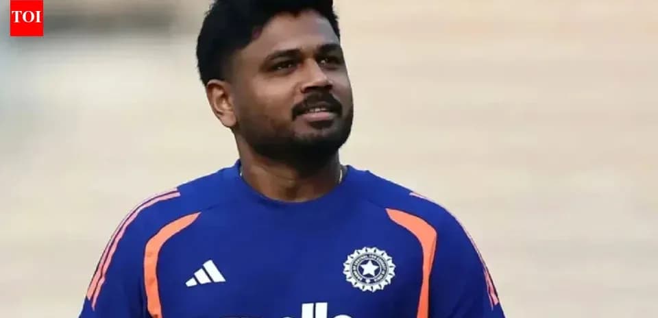 Cricketer wearing blue team jersey during practice