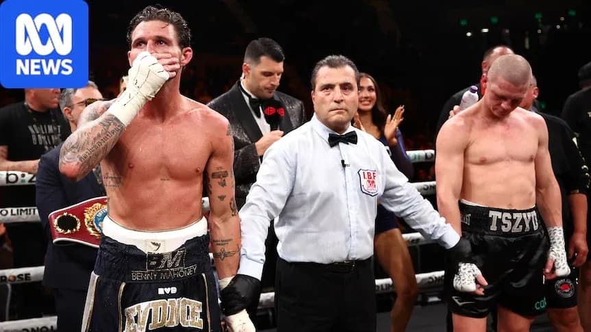 Boxers after match with referee in ring