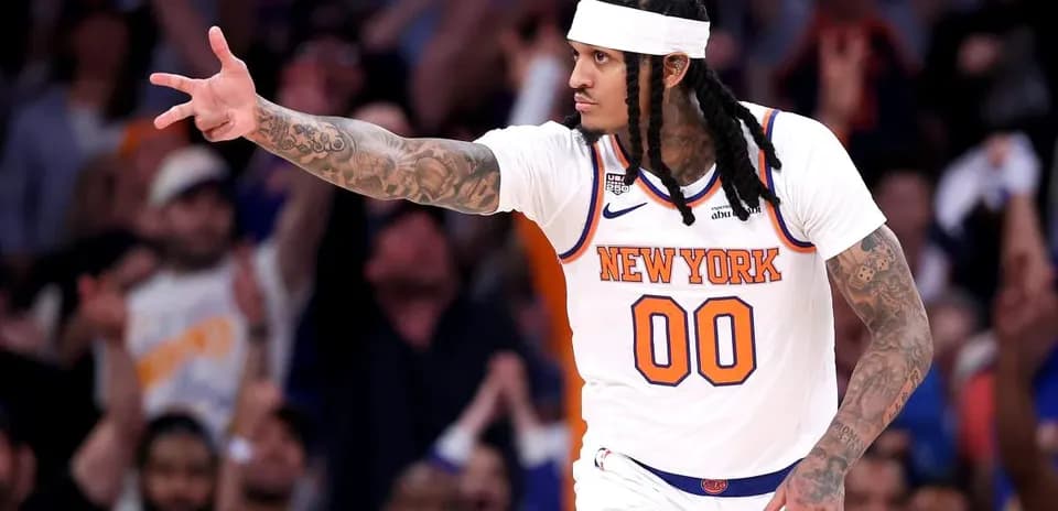 Player celebrating during a basketball game at Madison Square Garden