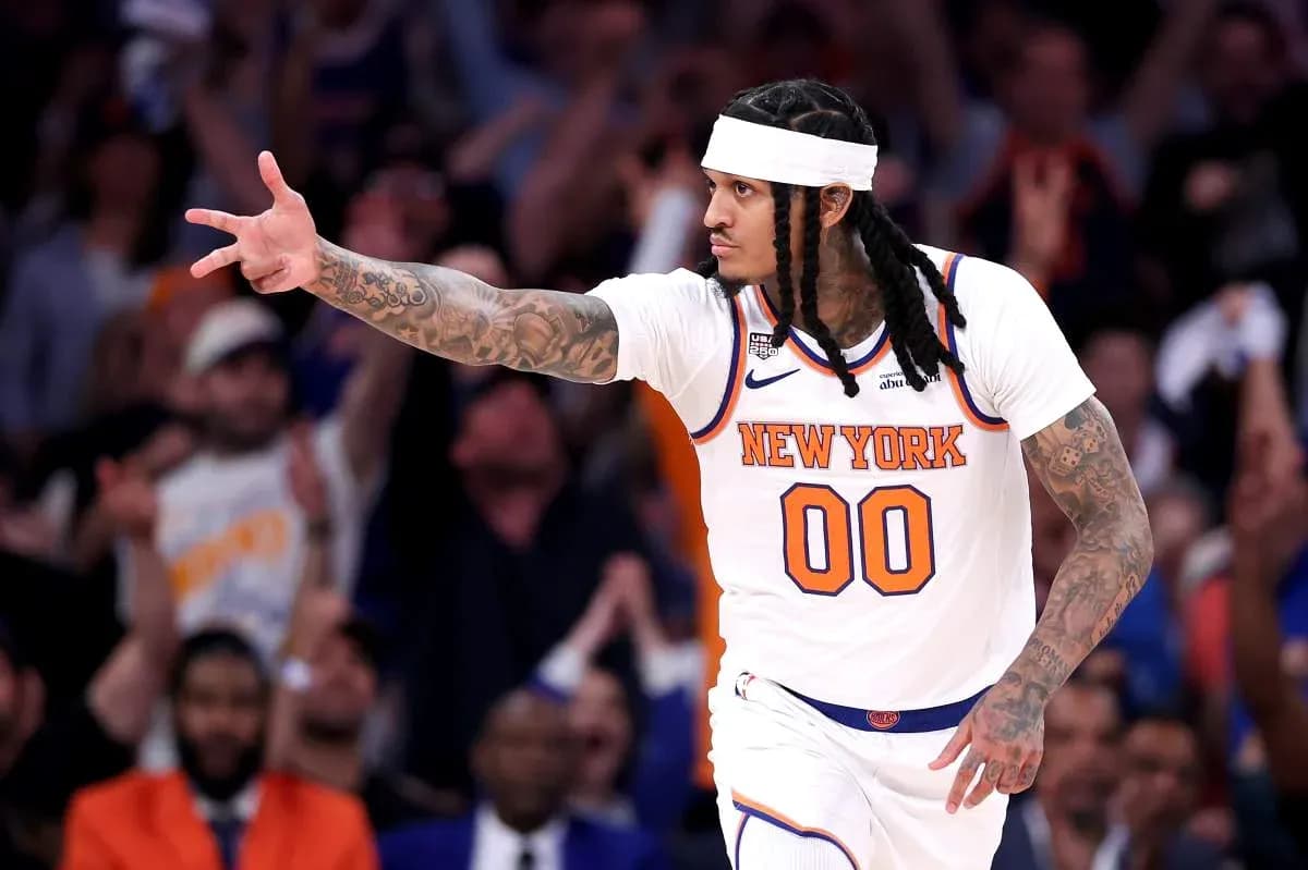Player celebrating during a basketball game at Madison Square Garden
