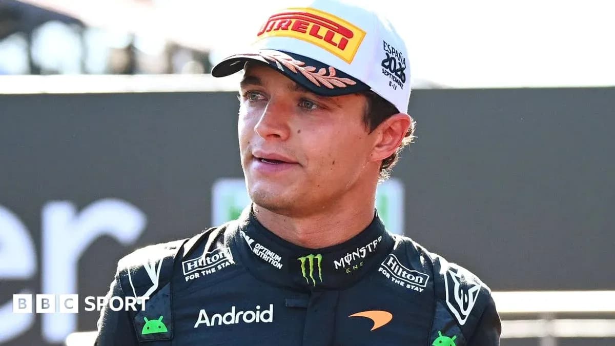 Driver speaking after a race in racing suit
