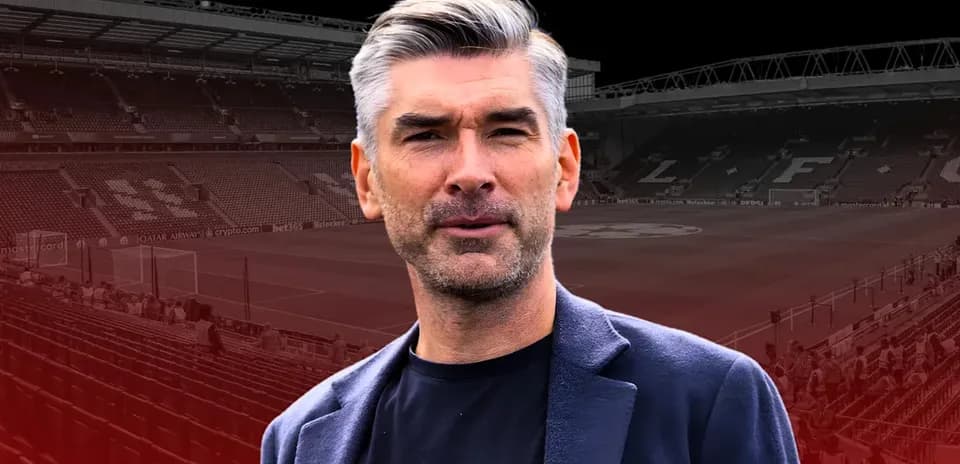 Person in front of a football stadium background