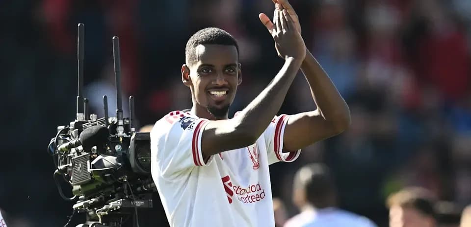 Player celebrating and applauding fans after match