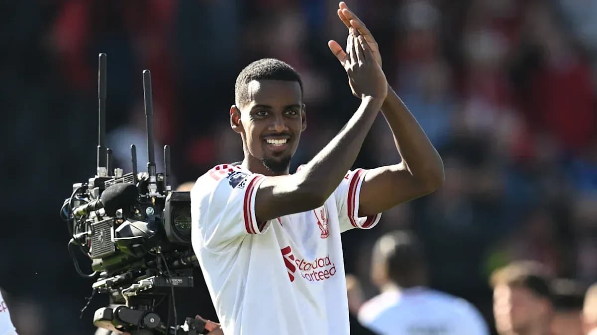 Player celebrating and applauding fans after match