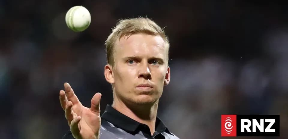 Umpire preparing to bowl during cricket match