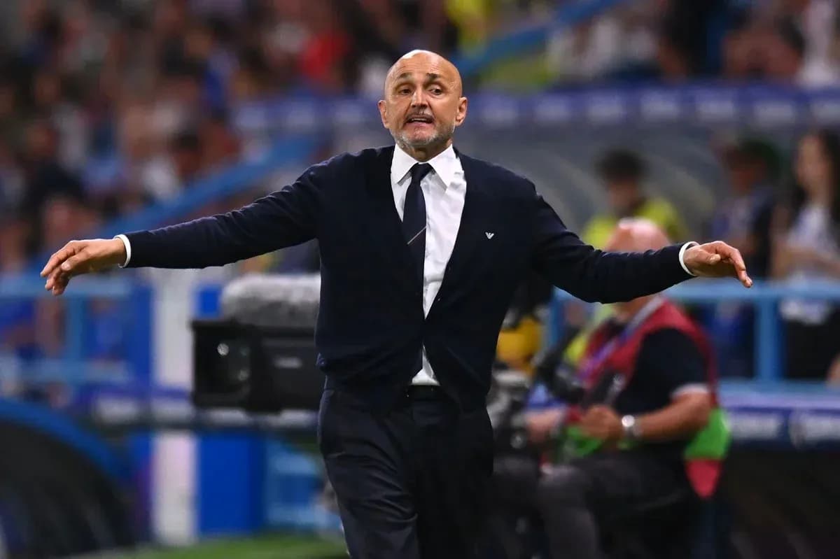 Coach gesturing on the sidelines during a match