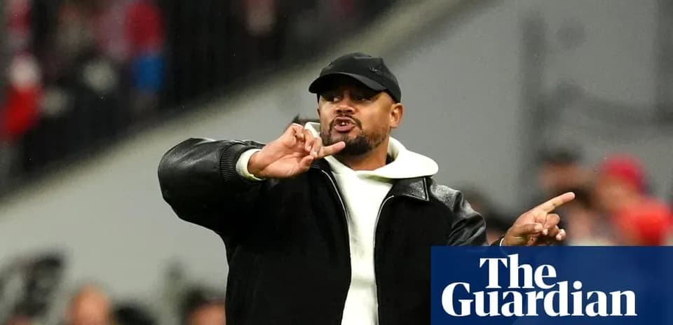 Coach gesturing during a football match