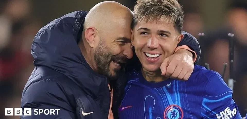 Coach and player celebrating after a match