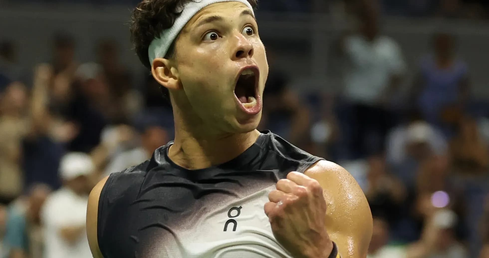 Tennis player celebrating a victory with excitement