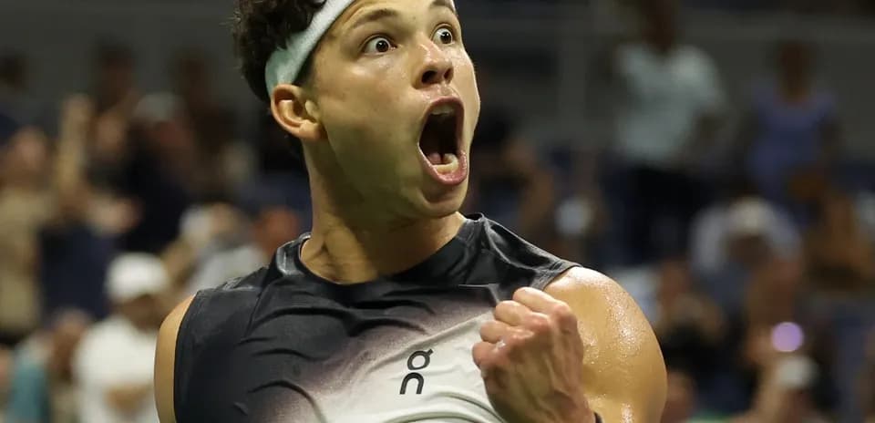 Tennis player celebrating a victory with excitement