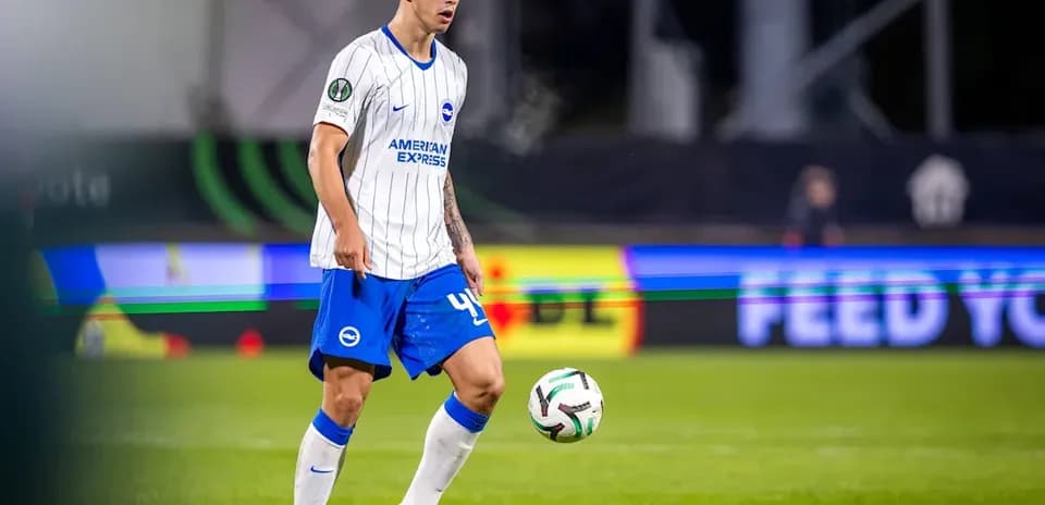Player in blue and white kit preparing to kick ball