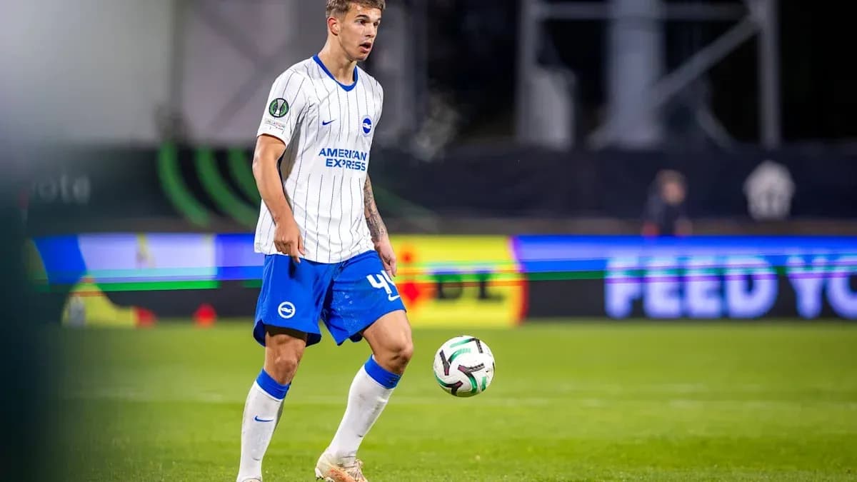 Player in blue and white kit preparing to kick ball