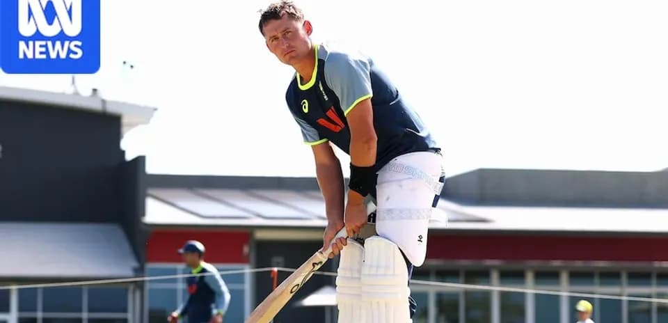 Cricketer preparing to bat during practice session