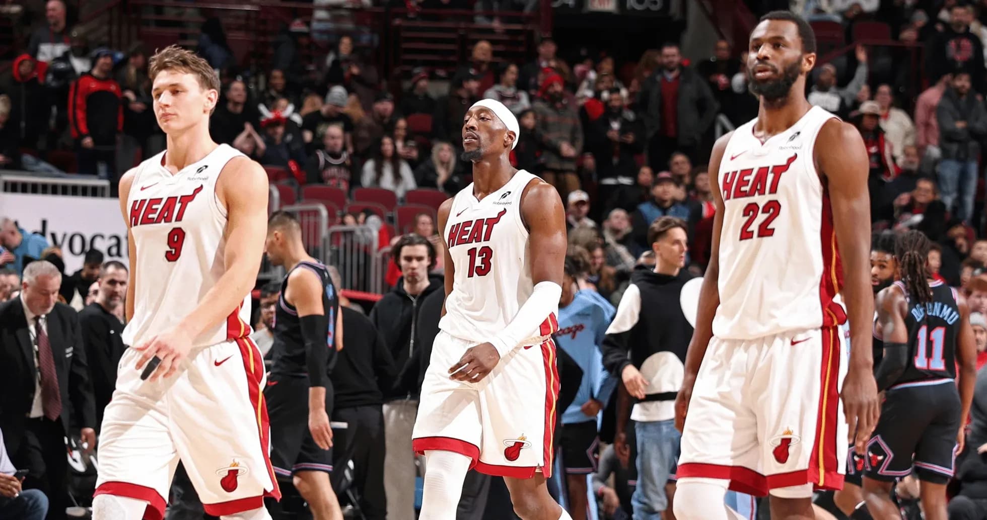 Miami Heat players walking off the court