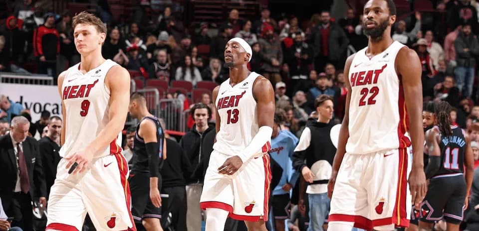 Miami Heat players walking off the court
