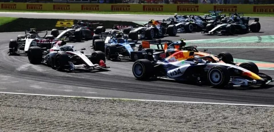 Formula 1 cars racing on track during competition