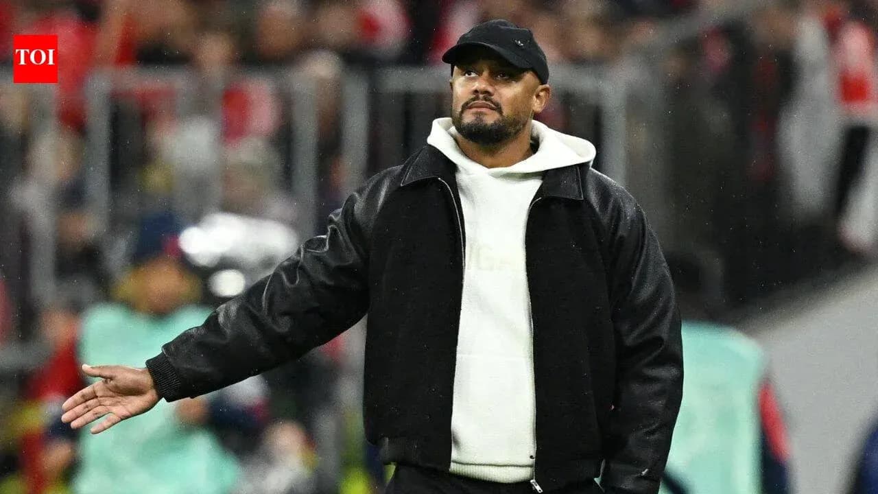 Coach gesturing during a football match on field