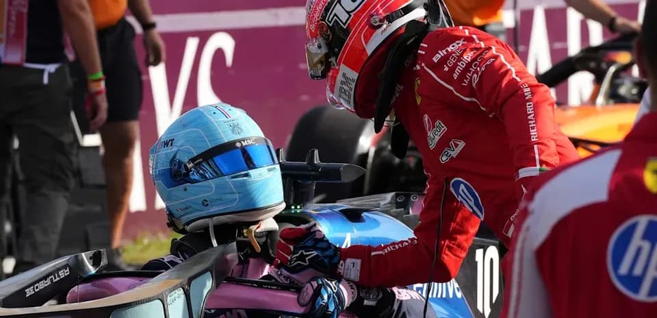 Two drivers interacting after a race incident