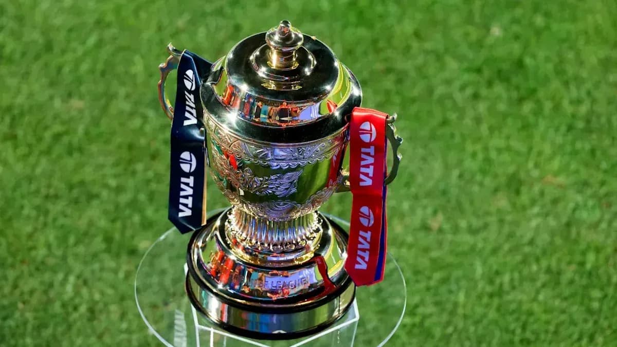 Trophy with ribbons displayed on a glass stand
