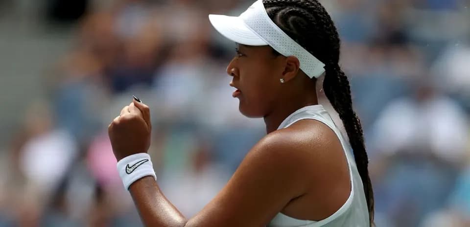 Tennis player celebrating during a match