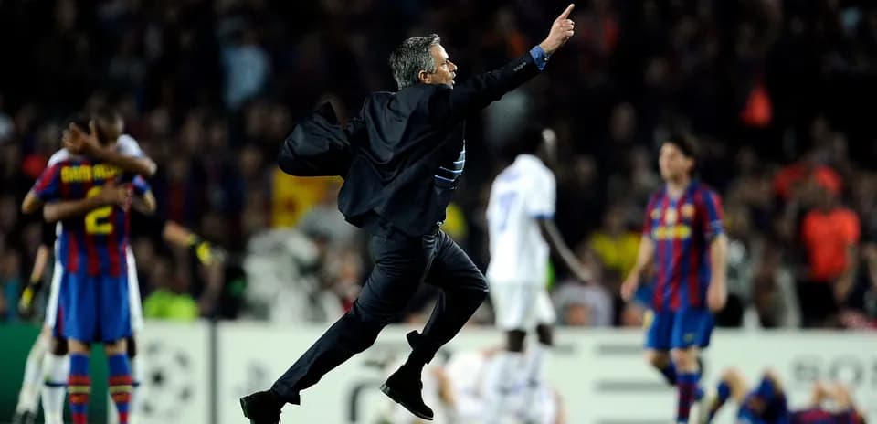 Manager celebrating a goal during intense match