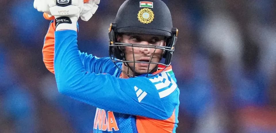 Batter preparing to strike during cricket match