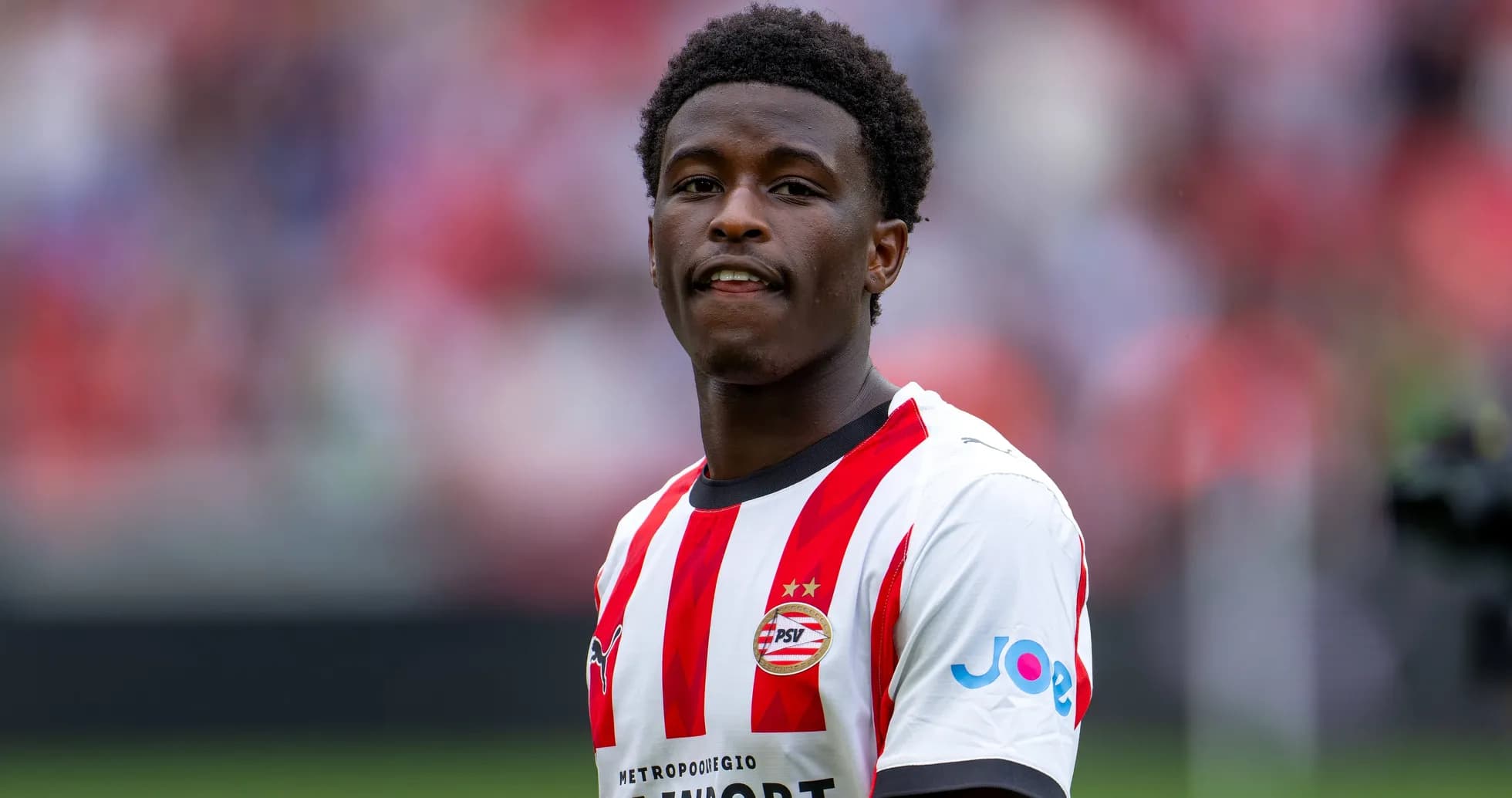 Player in PSV Eindhoven jersey during match warm-up