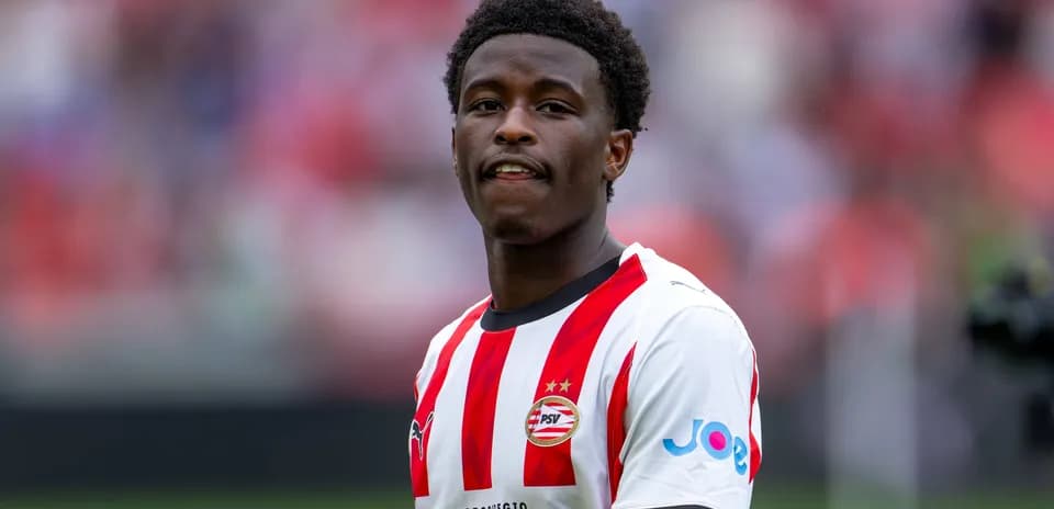 Player in PSV Eindhoven jersey during match warm-up